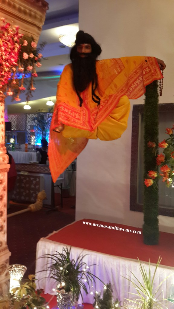 A Sadhu (hired artist) floating  mid-air